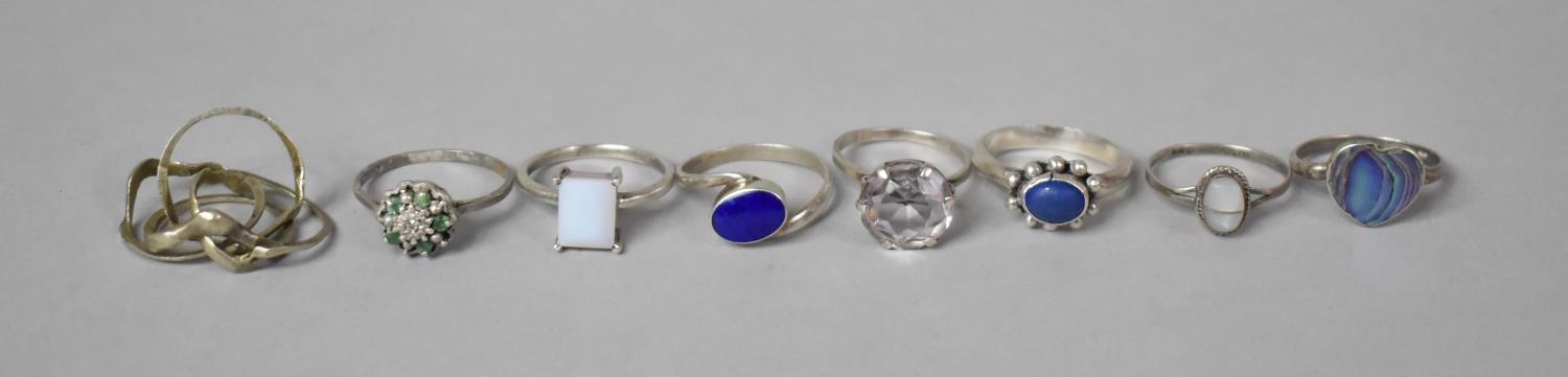 A Collection of Eight Various Silver Dress Rings Including Puzzle Example etc