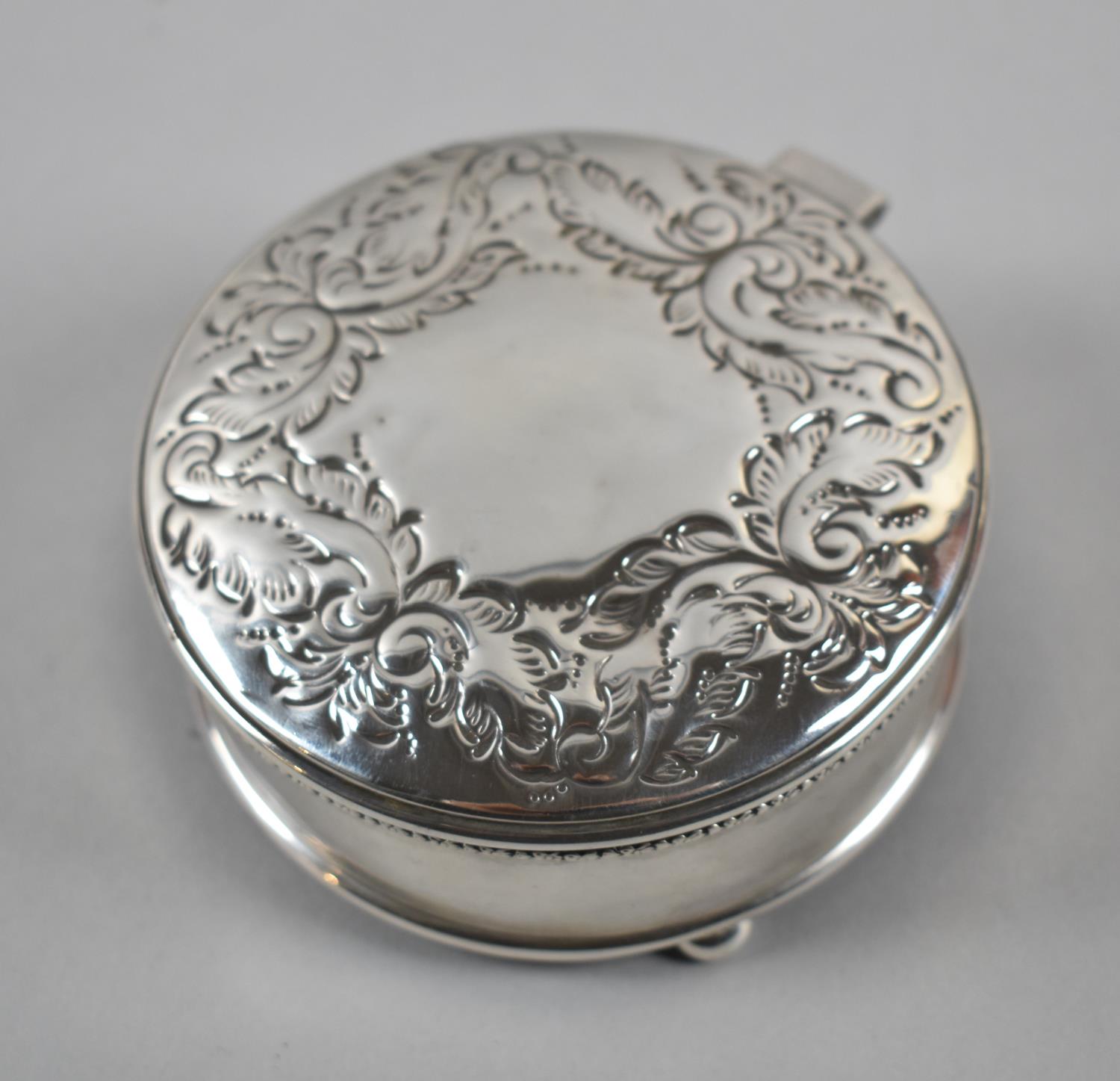 A Silver Circular Dressing Table Jewellery Box on Three Bun Feet, Repousse Work Decoration to Hinged - Image 2 of 4