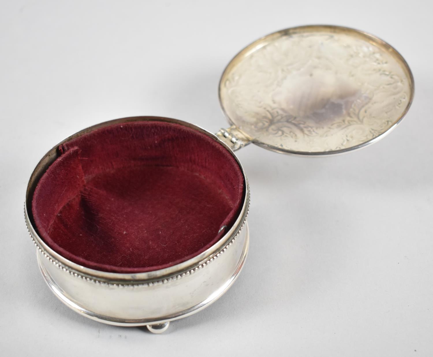 A Silver Circular Dressing Table Jewellery Box on Three Bun Feet, Repousse Work Decoration to Hinged - Image 3 of 4