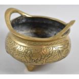 A Reproduction Chinese Bronze Two Handled Censer on Three Feet, Seal mark to Base, 13cm wide and