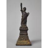 A Late 19th/Early 20th Century American Novelty Money Box in the Form of the Statue of Liberty, 16cm