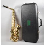 A Mid 20th Century Brass Saxophone, The Elkhart Series II, In Carrying Case