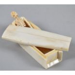 A Novelty Bone Carved Skeleton Set in Coffin Shaped Box, 11.5cm Long