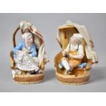 A Pair of Continental Porcelain Figures, Gent and Lady Sat in Barrels, Some Condition Issues