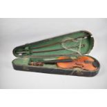 A Late 19th/Early 20th Century Violin and Two Bows, All in Need of Attention Together with Wooden