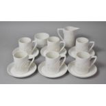 A Portmeirion White Glazed Totem Pattern Coffee Set to comprise Six Cans and Saucers, Sugar Bowl and