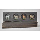 A Collection of Seven Wooden Framed Magic Lantern Slides, Each Containing Four Circular Coloured