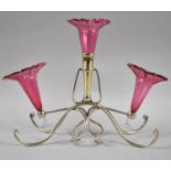 An Edwardian Silver Plated and Cranberry Glass Three Trumpet Epergne on Scrolled Wired Support, 21.