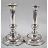 A Pair of Sheffield Plated Candlesticks, 20cm high