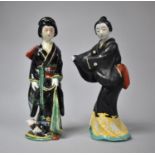 A Pair of Mid 20th Century Heavy Porcelain Figures of Geisha Girls in Traditional Dress Decorated