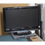 An E-motion 22" TV, DVD player and remotes