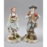 A Pair of Continental Porcelain Figures, Gent with Dog and Lady with Lamb, Crossed Sword Mark to