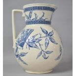 A Swallow Pottery Blue and White Toilet Jug Decorated with Swallows and Blossom, 28cm high