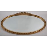 A Large Gilt Framed Oval Wall Mirror with Bevelled Glass, 72x48cm Overall