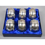 A Set of Six Cased Silver Napkin Rings, Birmingham Hallmark