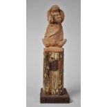 A Painted Terracotta Latin American Sculpture in the Form of Virgin Mary at Prayer, 30cm high