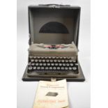 A Vintage Imperial Good Companion Standard Model Portable Typewriter with Instruction Book