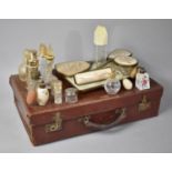 A Vintage Leather Case Containing Dressing Table Items