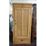 A Stripped Pine Robe with Base Drawer and Panelled Door, 84cm Wide