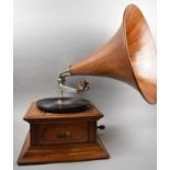 A Restored Oak Cased His Master's Voice Wind-Up Gramophone with Wooden Trumpet