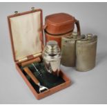 A Vintage Leather Case Containing Two Hip Flasks and a Cocktail Shaker (Unrelated) Together with a