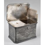 A Silver Plated Two Division Teacaddy with Relief Decoration to all Sides and Hinged Lid,