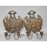 A Pair of Wall Hanging Bronzed Two Branch Novelty Candelabra in the Form of Bats, 33cm high