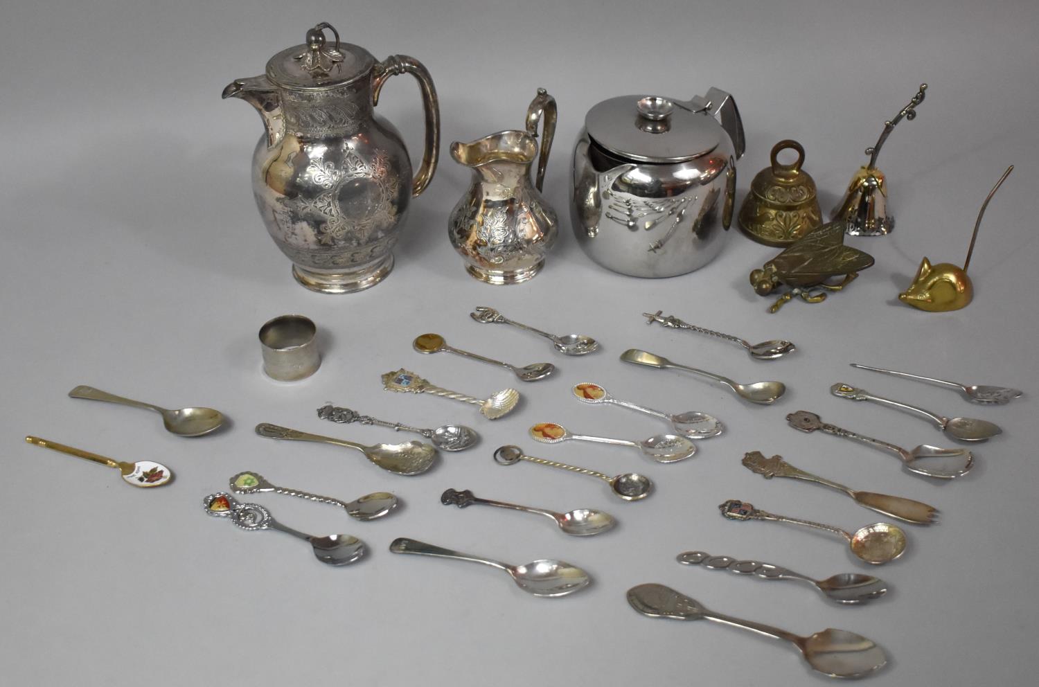 A Collection of Various Metalwares to Include Silver Plated Jug, Teapot, Hot Water Jug, Various