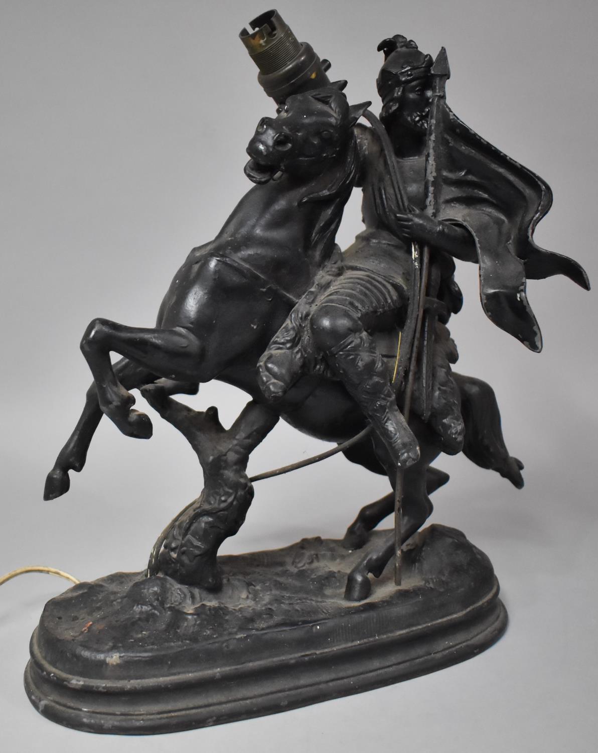 A Spelter Table Lamp in the Form of Warrior on Horseback , 35cm high, Condition Issues
