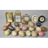 A Collection of Stoneware Eggs and Modern Carriage/Mantle Clocks