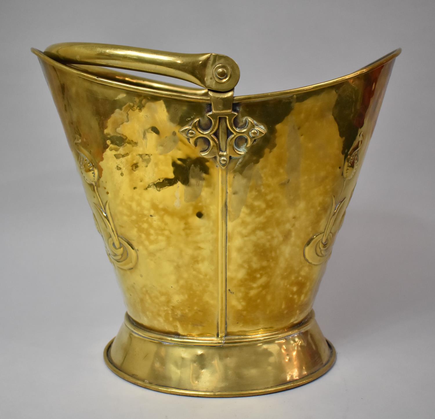 A Brass Helmet Shaped Coal Scuttle with Pressed Art Nouveau Floral Decoration, 33cm High - Image 2 of 4