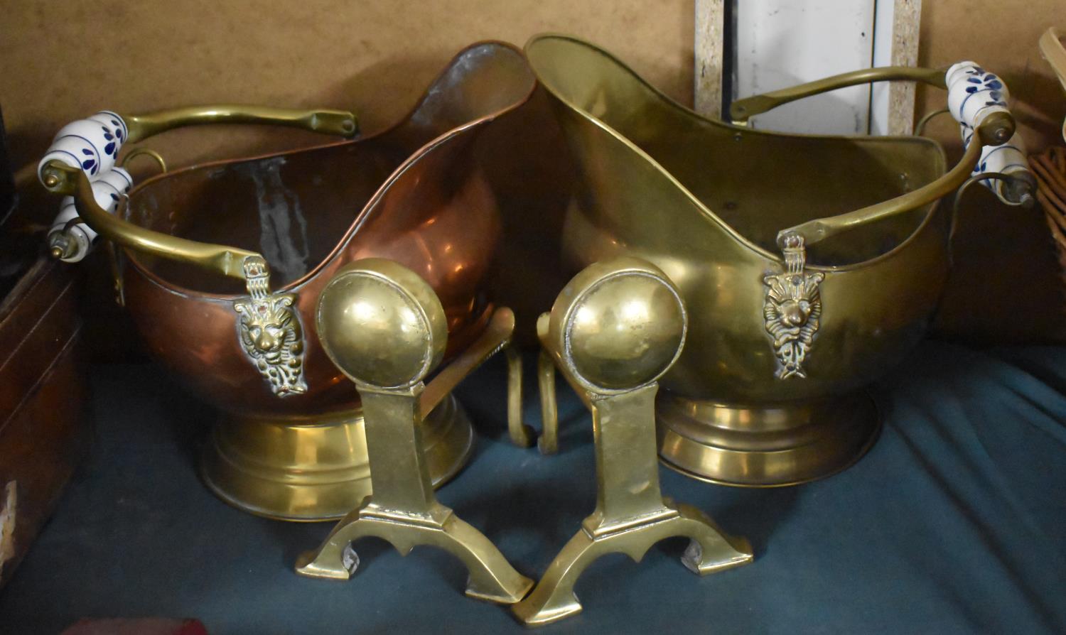 Two Modern Brass Helmet Coal Scuttles with Ceramic Handles and a Pair of Fire dogs