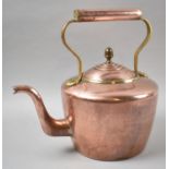 A Mid 20th Century Copper and Brass Kettle, 30cm high