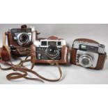 A Collection of Three Vintage Leather Cased 35mm Cameras