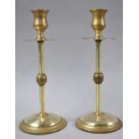 A Pair of Ecclesiastic Style Brass Candlesticks, 21.5cm high