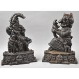 A Pair of Heavy Cast Iron Punch and Judy Doorstops, 33cm high