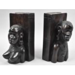 A Pair of Carved African Ebony Bookends with Masi Male and Female Carvings Supporting Book Rests,