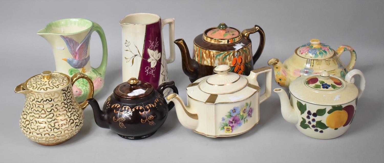 A Collection of Various 20th Century Teapots, Jugs Etc