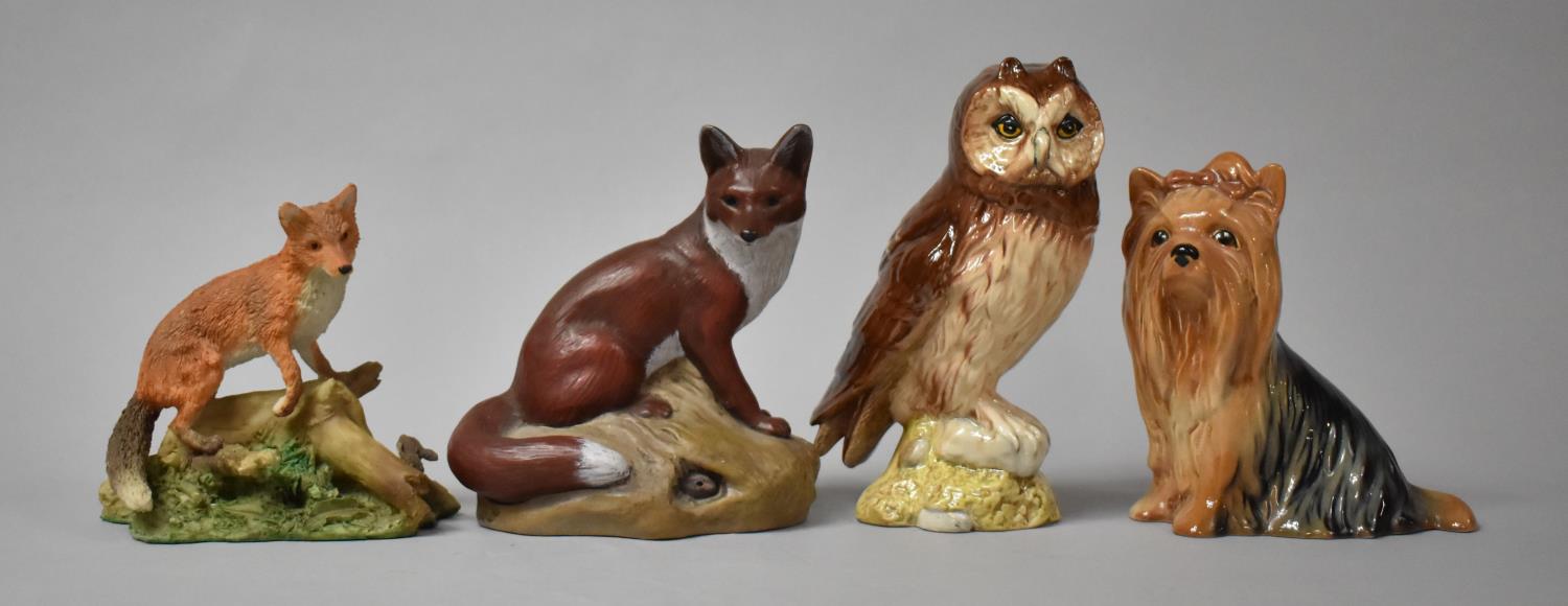 A Coalport Fox Ornament, Sylvac Terrier, Beswick Whyte and Mackay Owl Decanter (empty) and a Poole