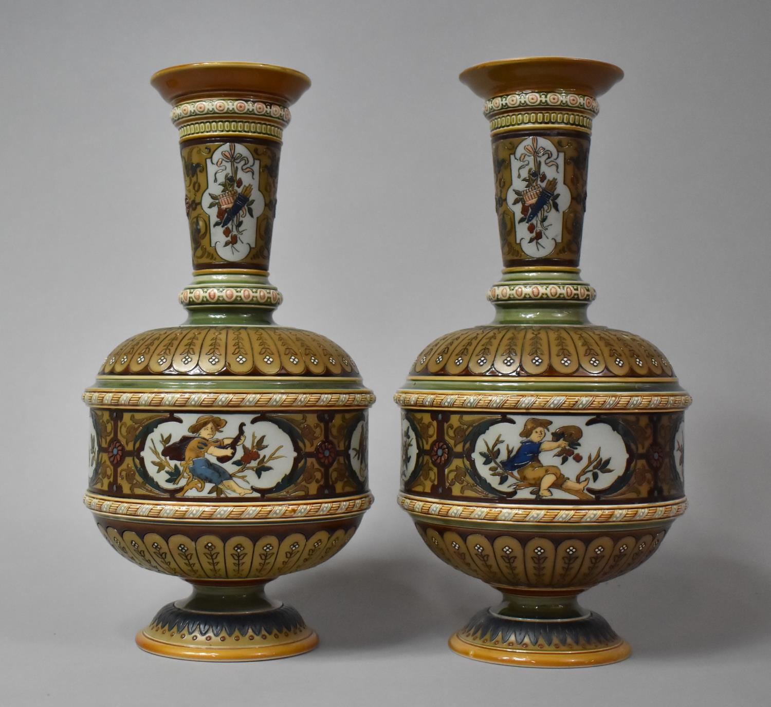 A Pair of Mettlach Salt Glazed Stoneware Vases in Usual Colour Enamels, 32cm high