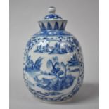 A Chinese Blue and White Lidded Vase with Cartouche Exterior Scene Decoration Depicting Village