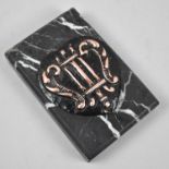 A Rectangular Black Marble Desktop Paperweight with Black Painted Copper Mount in a Heart Shape,