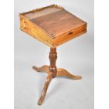 A 19th Century Elm Writing Slope with Galleried Top and Side Pen Drawer Having Hinged Lid to