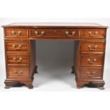 A Late 20th Century Mahogany Kneehole Desk with Tooled Leather Writing Surface, One Long and Two