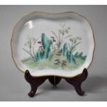 A Chinese Porcelain Shaped Dish in the Famille Verte Pallette, 17cm Wide