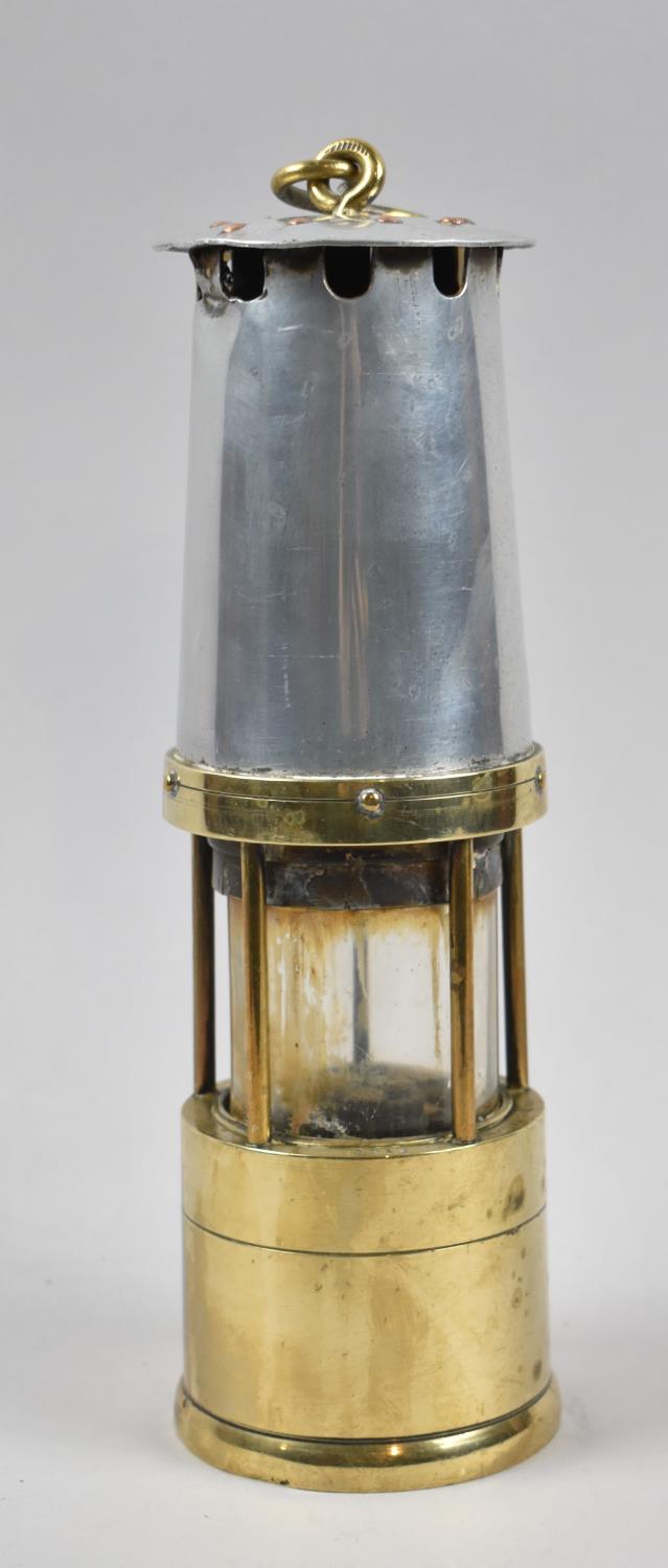 A Brass Mounted Miners Safety Lamp by Naylor, Wigan no.3712, 28cm high