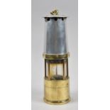 A Brass Mounted Miners Safety Lamp by Naylor, Wigan no.3712, 28cm high