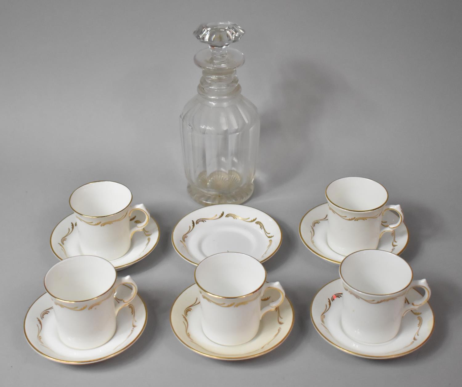 A Royal Stafford Gilt and White Coffee Set to comprise Five Cans, Six Saucers, together with a