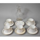 A Royal Stafford Gilt and White Coffee Set to comprise Five Cans, Six Saucers, together with a