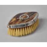 A Silver Mounted Tortoiseshell Ladies Hairbrush, 9cm long